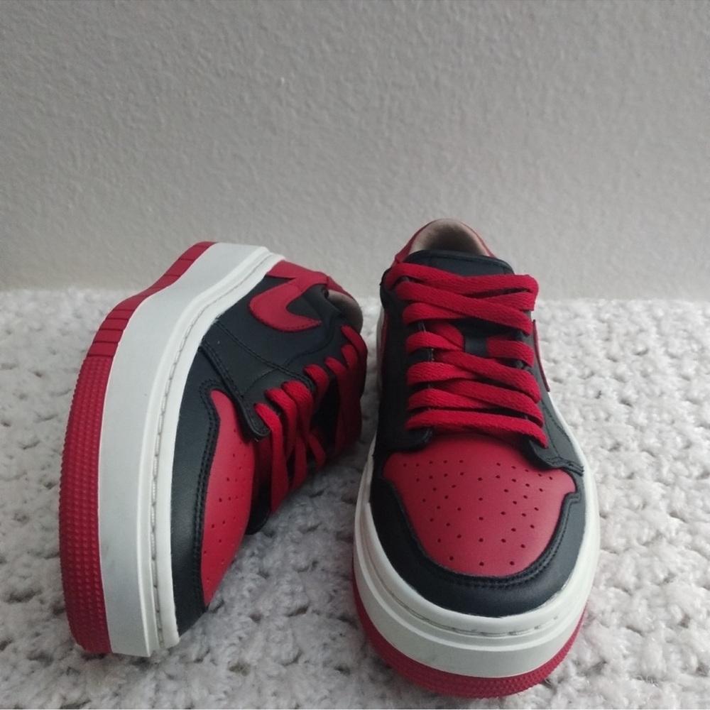 Nike Red and Black Sneakers with Sporty Design